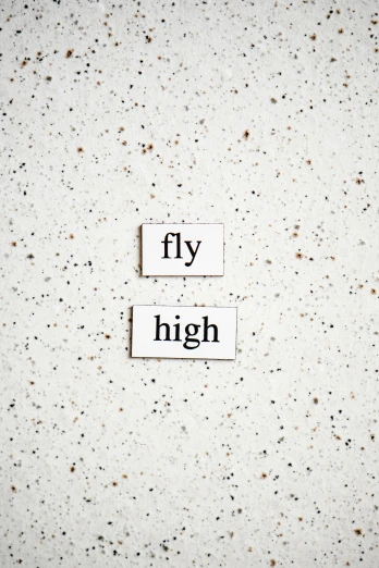 a piece of paper with the words fly high on it, trending on unsplash, concrete poetry, diptych, high fashion superpowers, high school