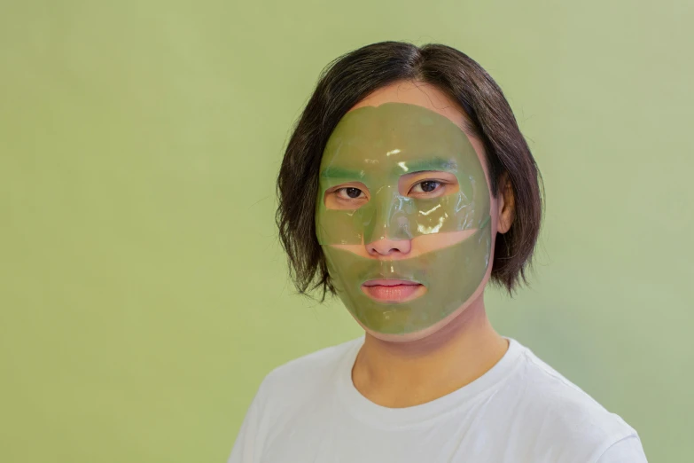 a woman with a green mask on her face, inspired by Russell Dongjun Lu, reddit, face and body clearly visible, photoshoot for skincare brand, asian male, avatar image