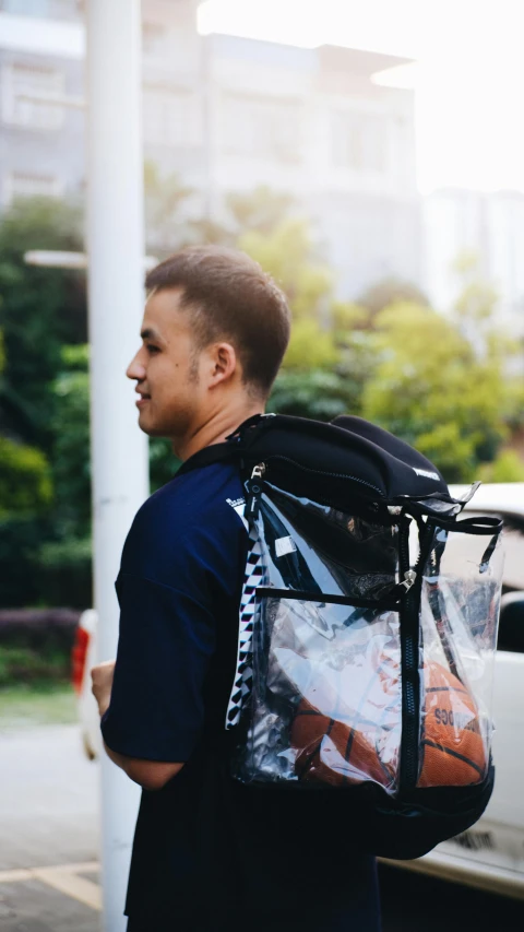 a man is carrying a bag with food in it