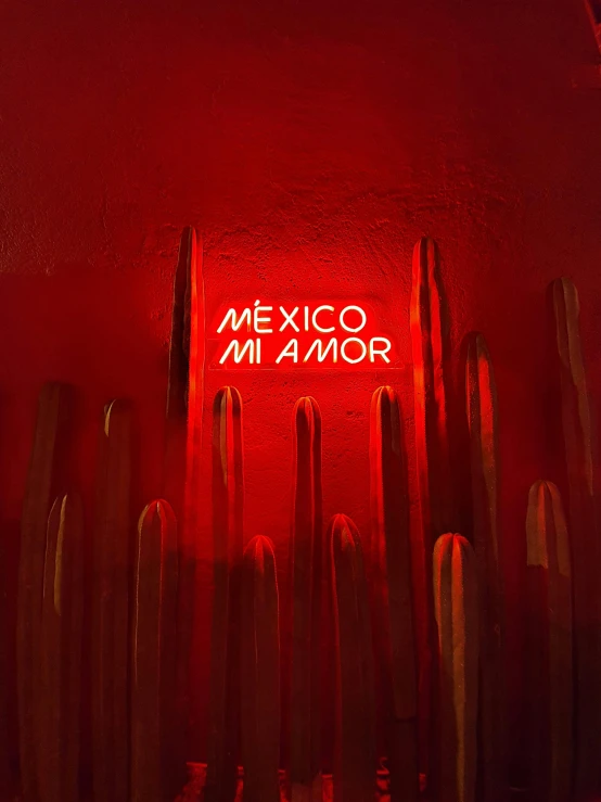 a red neon sign hanging from the side of a building, an album cover, by Briana Mora, pexels contest winner, mexico, profile image, mexican standoff, ( ( theatrical ) )