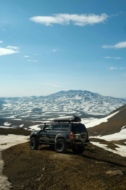 truck on a mountain with the back seat down