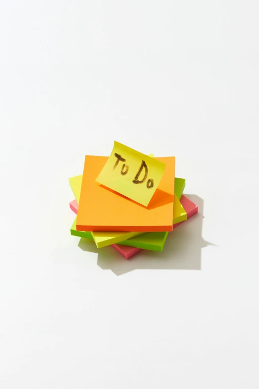 a pile of post it notes sitting on top of each other, product image, detail shot, detailed product image, large)}]