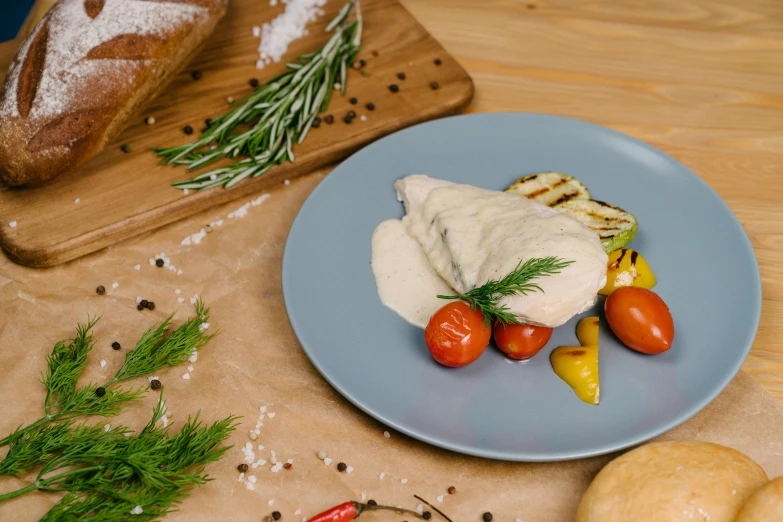 a plate of food sitting on top of a wooden table, a picture, chalk white skin, thumbnail, chicken, espoo