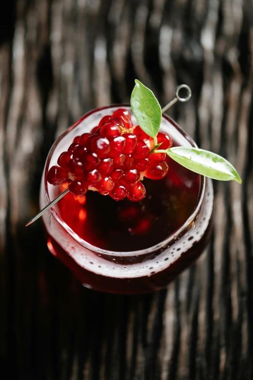 a cocktail with a garnish garnish garnish garnish garnish garnish garnish garnish, a digital rendering, by Alexander Brook, pexels, wild berry vines, high angle close up shot, an island made of red caviar, tea