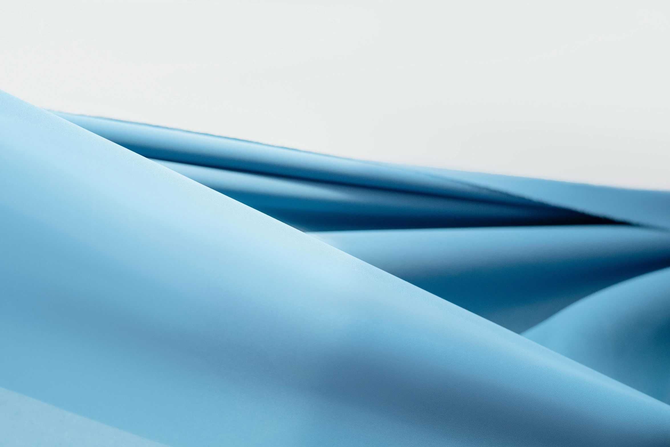 a close up of a blue cloth on a table, inspired by Zaha Hadid, gloss finish, pastel blue, posable pvc, axure sky