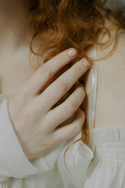 a woman wearing a collar and dress shirt