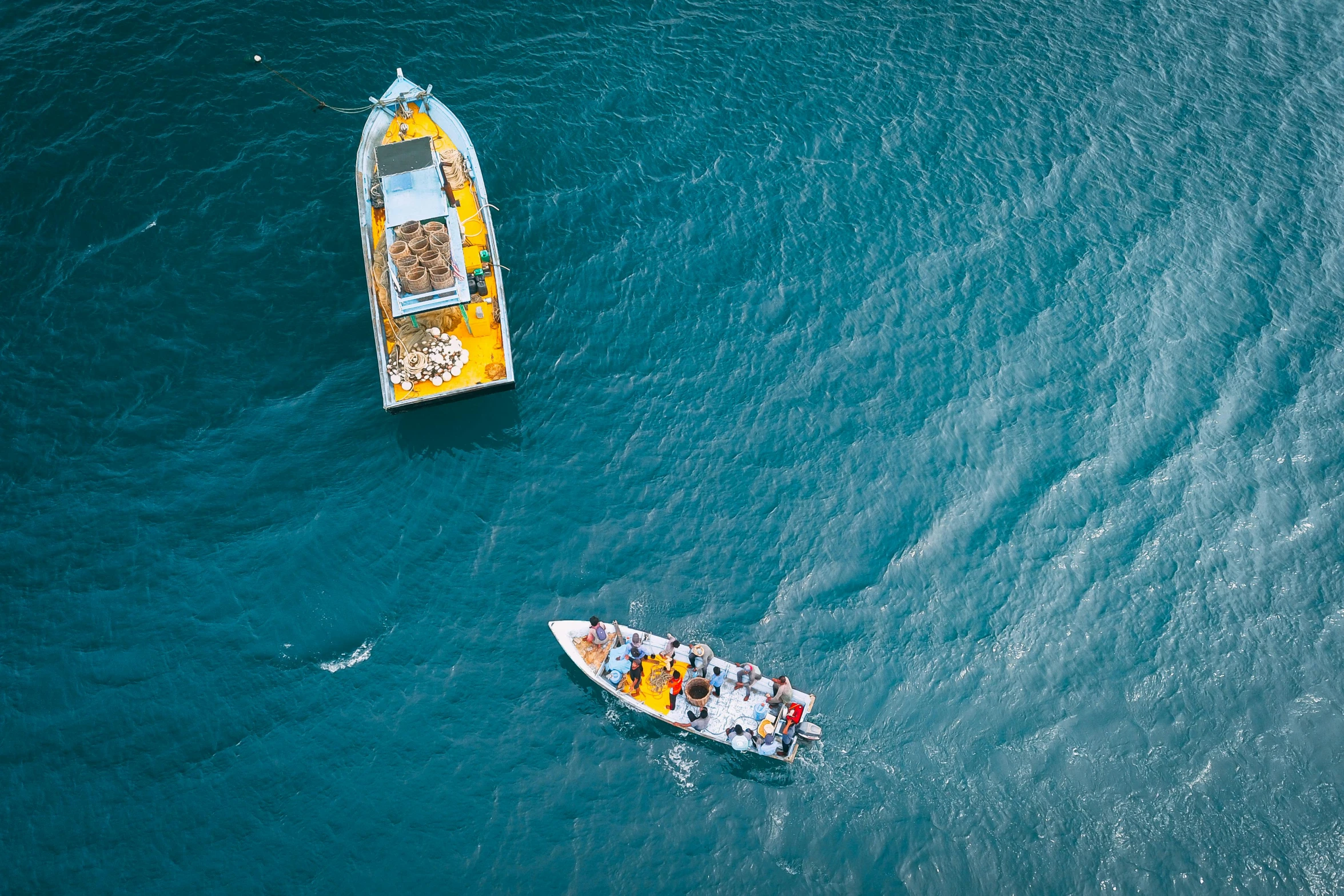 a couple of boats that are in the water, pexels contest winner, white and yellow scheme, birds eye, wellington, national geographic photo award