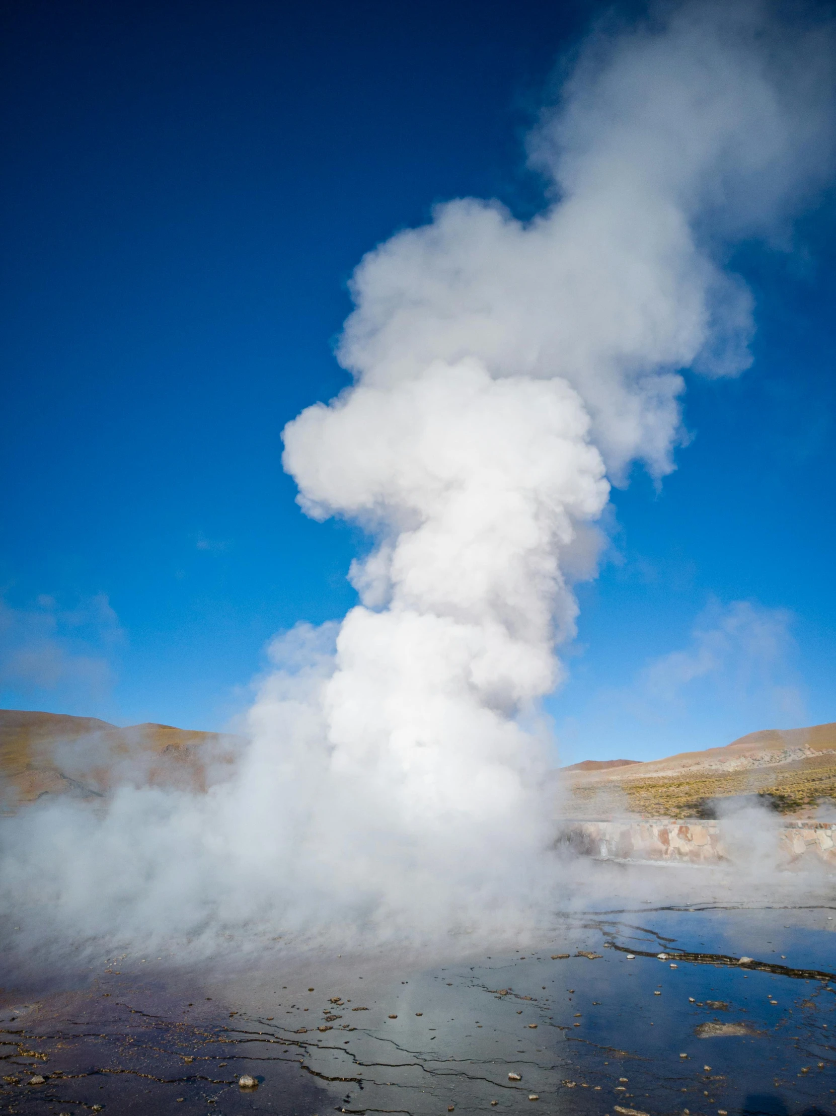 the steaming steam coming out from behind of the ground