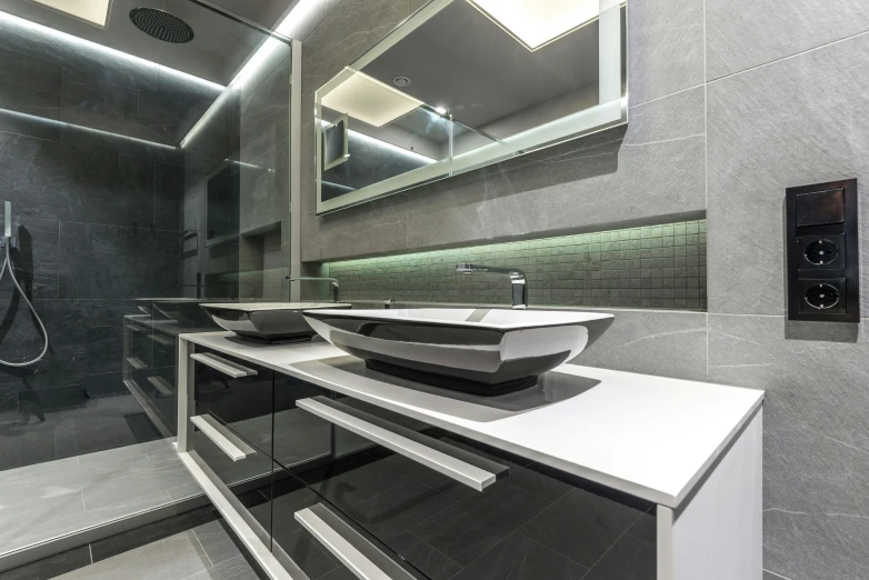 modern bathroom with glass and stone fixtures