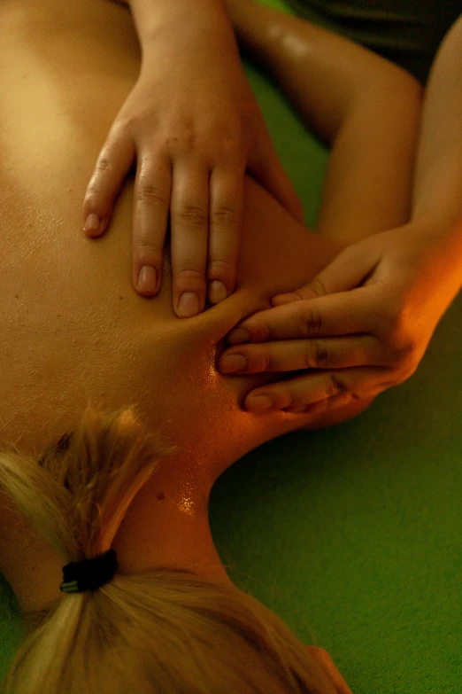 a woman getting a back massage at a spa, by Dan Scott, upsidedown, a green, high quality photo, square