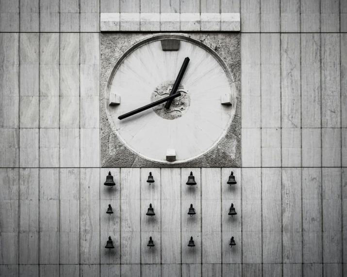 a black and white photo of a clock on a wall, inspired by Pierre Pellegrini, unsplash, postminimalism, collage style joseba elorza, square lines, parliament, drippy