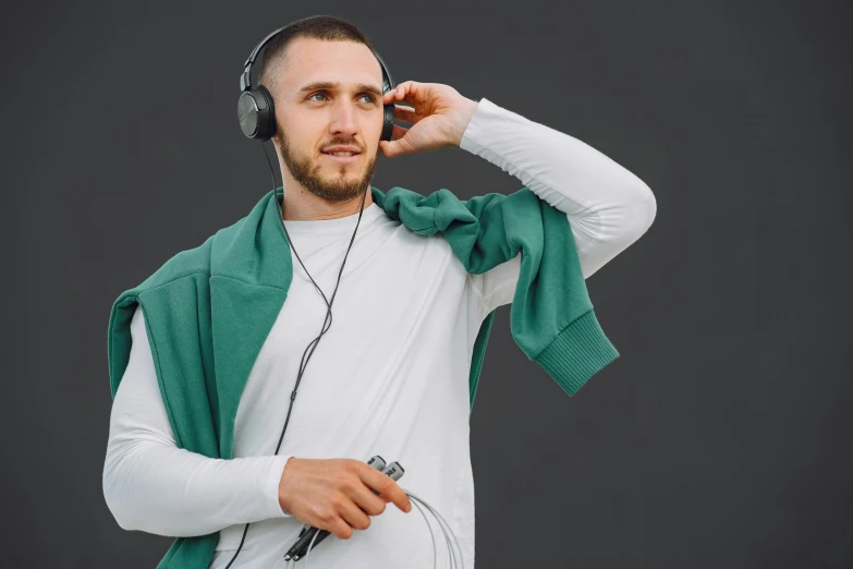 a man in headphones listening to soing