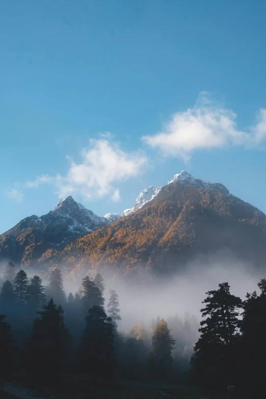 a view of a mountain with trees in the foreground, by Sebastian Spreng, unsplash contest winner, baroque, sichuan, natural morning light, mount olympus, mid fall