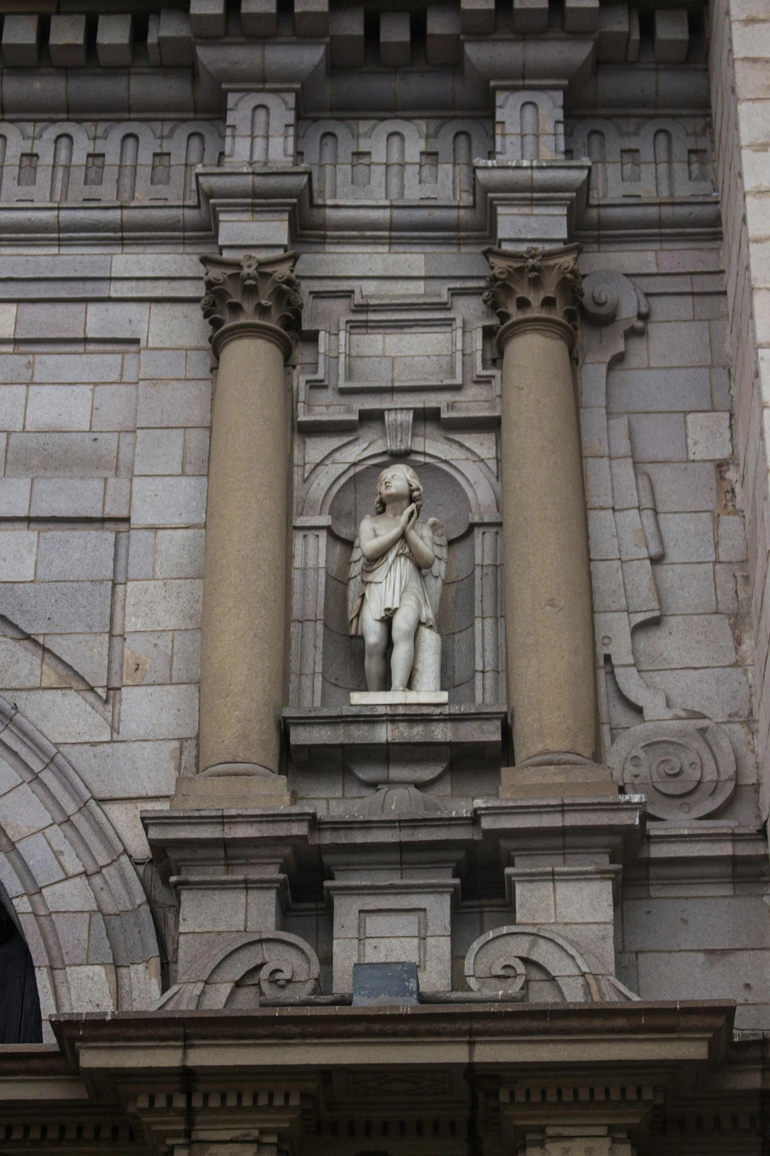 a clock that is on the side of a building, a statue, white stone arches, a pilgrim, details visible, holes in a religious man