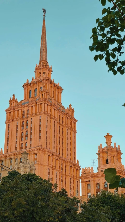 a picture of an intricate orange colored building