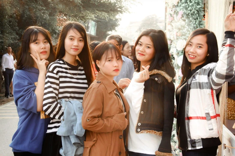 a group of women standing next to each other, a picture, inspired by Cui Bai, pexels contest winner, realism, cute girl, slide show, 15081959 21121991 01012000 4k, vietnamese woman