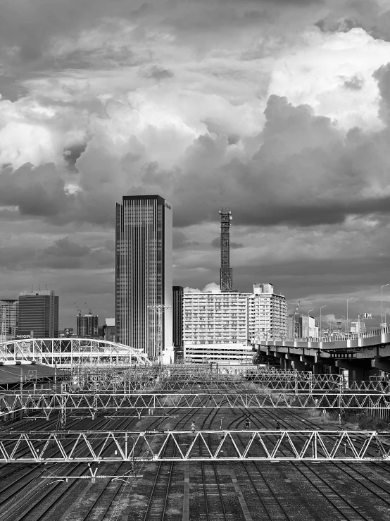 a black and white photo of a city skyline, by Tadashige Ono, cinematic. by leng jun, tokio aoyama, yuya nagai