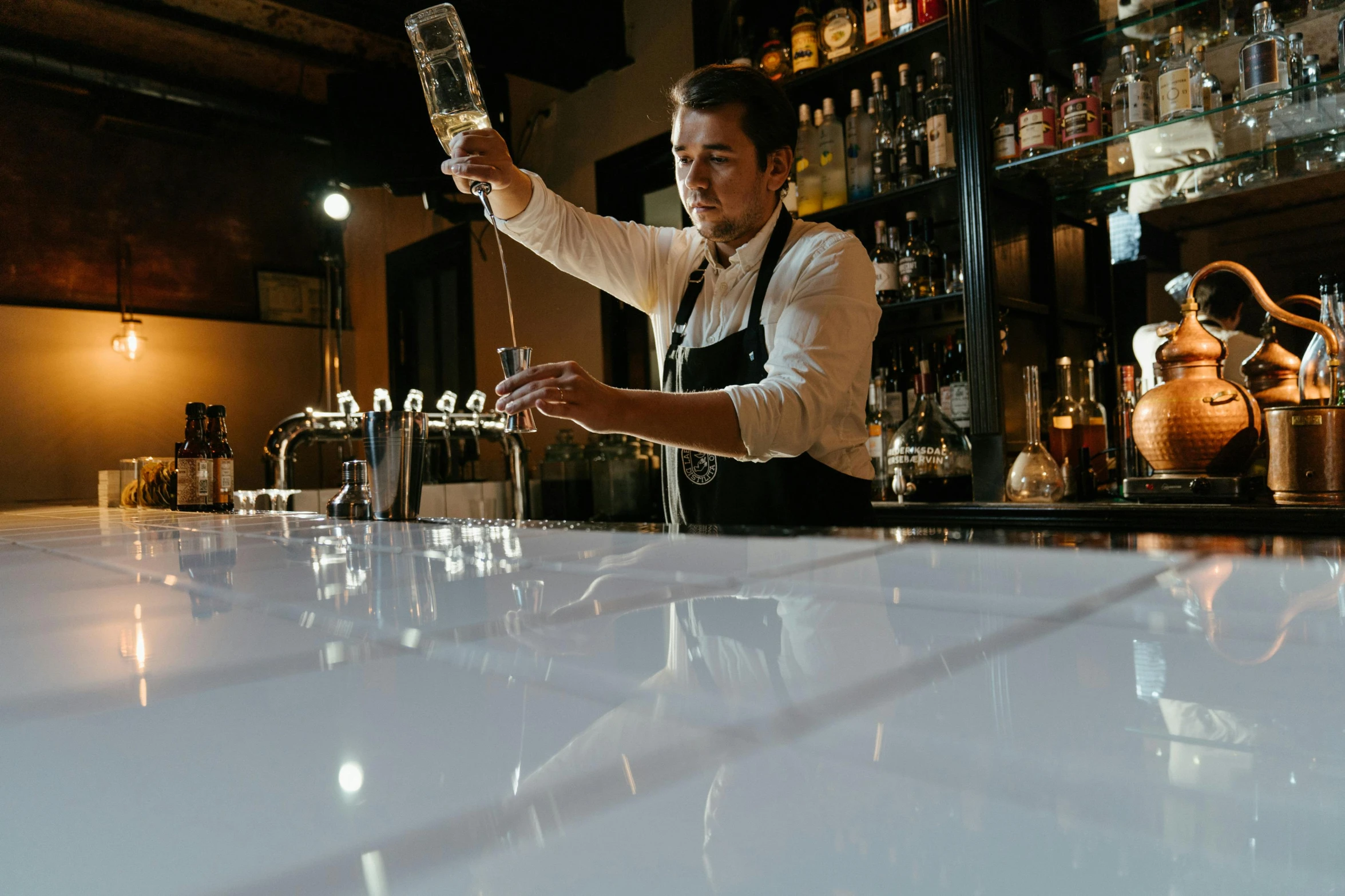 a bartender pouring a drink at a bar, by Matt Cavotta, profile image, christian orrillo, lachlan bailey, multiple stories