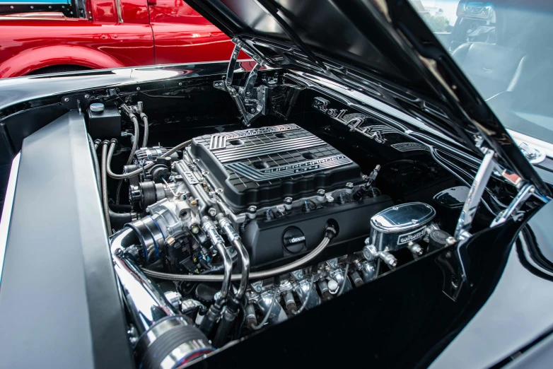 a close up of the engine of a car, by Matt Cavotta, pexels contest winner, insanely detailed c 10.0, black car, single solid body, performance
