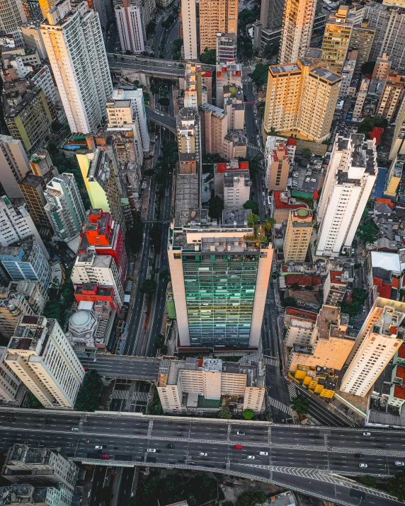 an aerial view of a city with lots of tall buildings, by Xavier Blum Pinto, pexels contest winner, graffiti, avenida paulista, 2 0 2 2 photo, multiple stories, the infrastructure of humanity