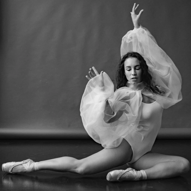 a ballet dancer wearing a tulle and a skirt