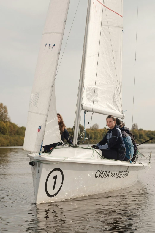 two people who are sailing on a sail boat