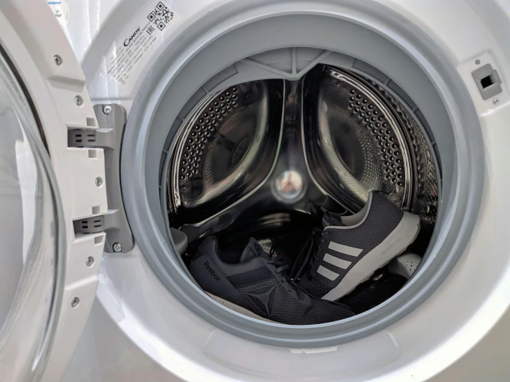 an image of a washing machine that has the door open