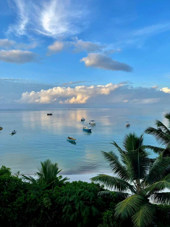 the water with boats on it is very clear