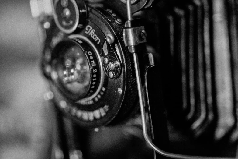 a close up view of a camera and an old fashioned camera