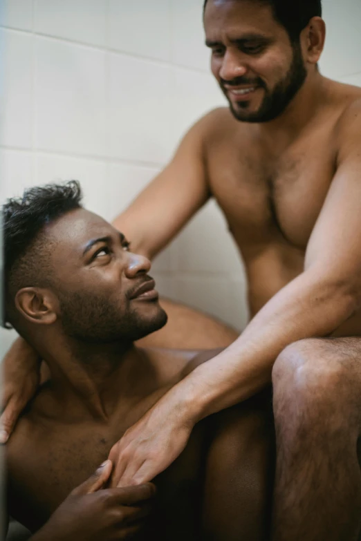 a man in the bathroom showing his hairy back