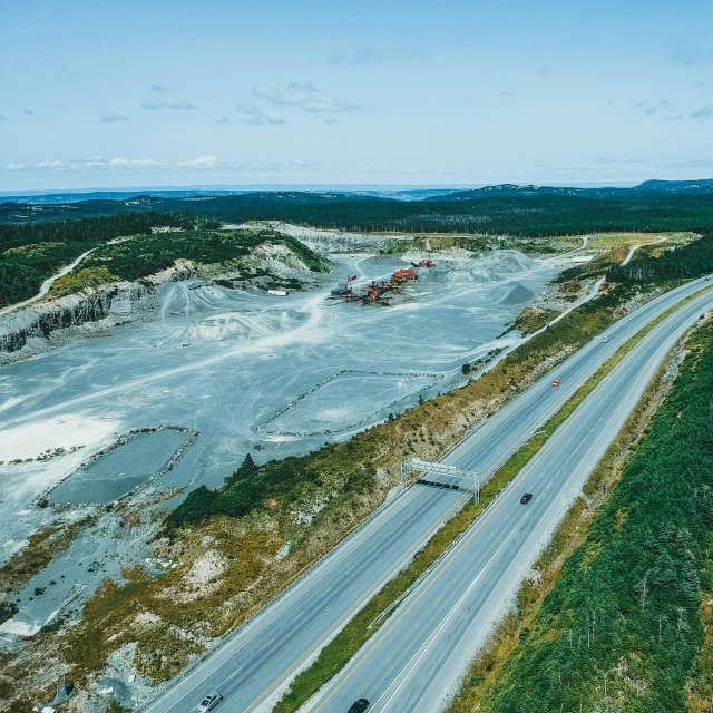 a view of a road next to a construction site