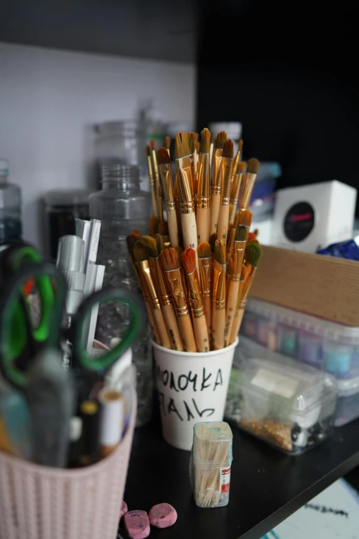 some different pens and markers on a table