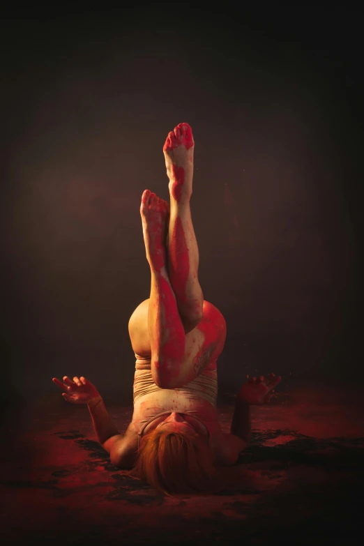 a woman in white and red colors is on the floor