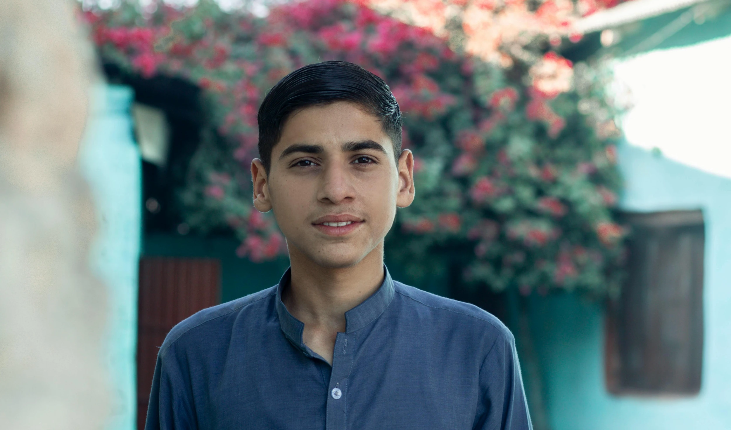 an image of a man in a blue shirt