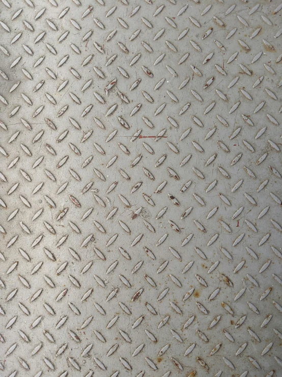 an old, metal background that looks to be dirty