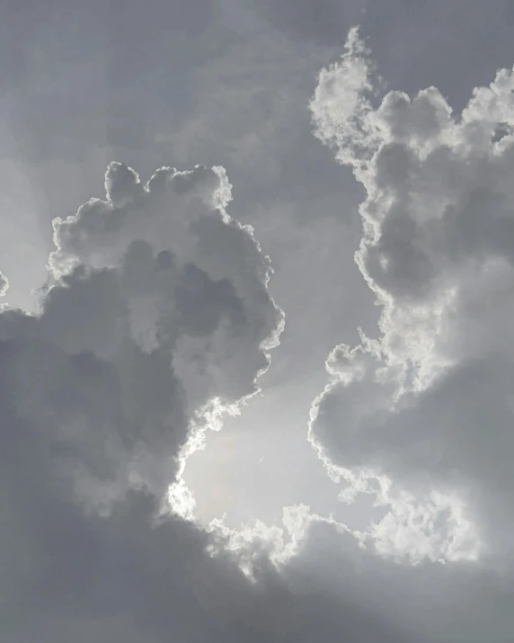 clouds that are forming a strange shape like creature