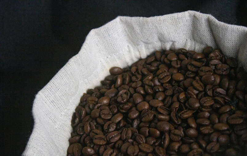 some coffee beans are in the sack