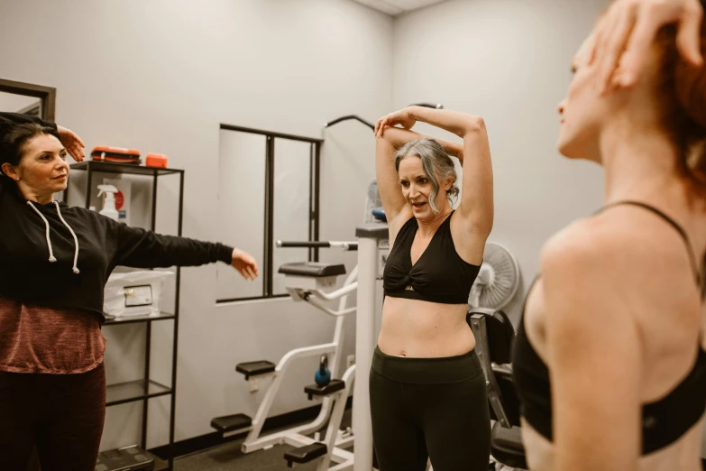 a woman doing exercise at the gym