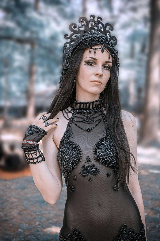 a young woman in mesh and mesh body suit