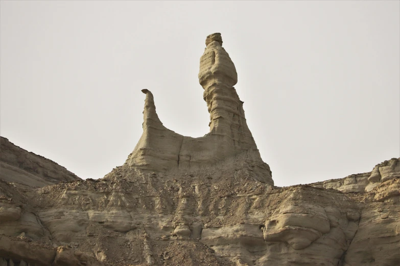 a stone formation with an open mouth at the top