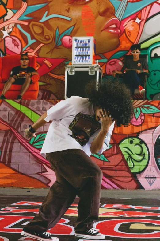 a person on a skateboard rides a rail