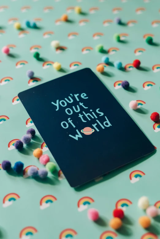 a book with a slogan reading you're out of this world
