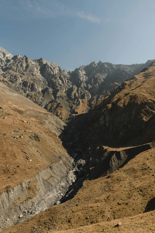 a mountain range with a valley below