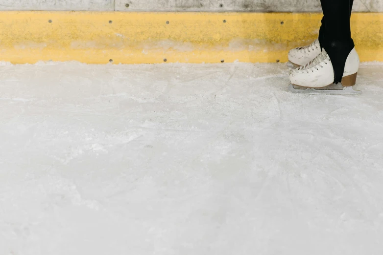 a person walking down a slope on some skates