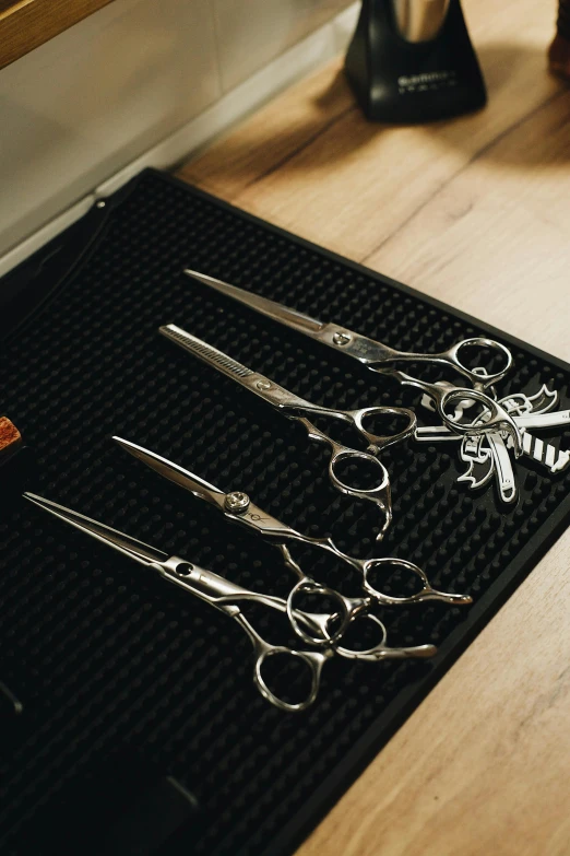 a group of scissors are on the table