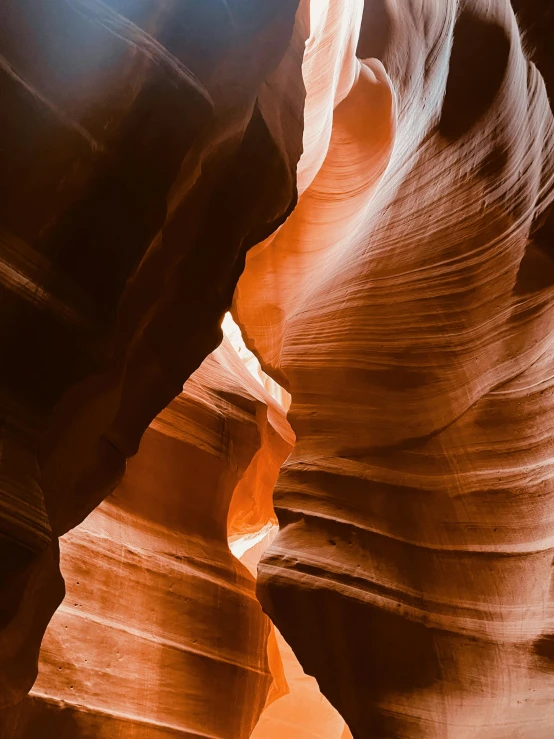 a narrow canyon with vertical walls that makes it appear to be slot canyon