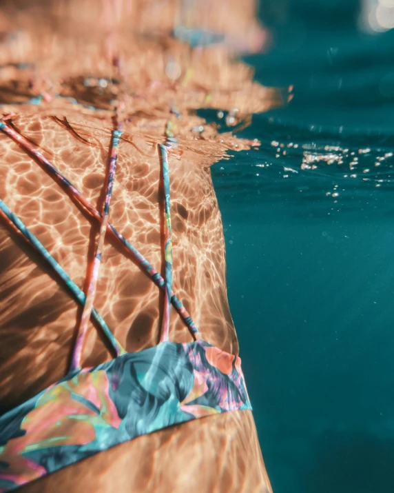 closeup of a man diving in the water