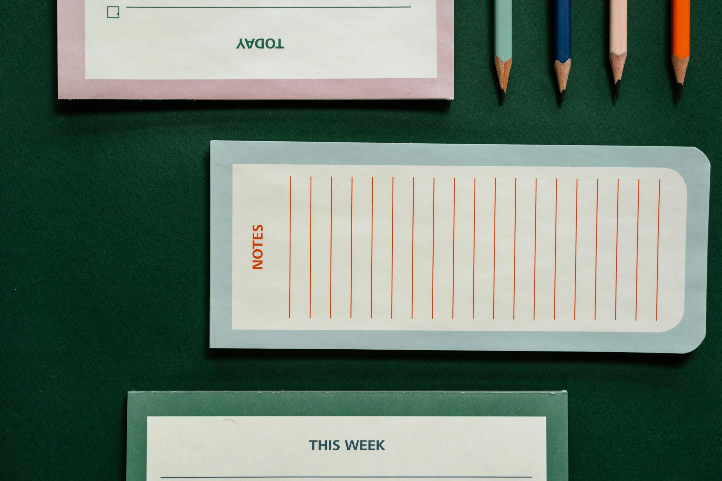 this desk has two tickets and a pencil