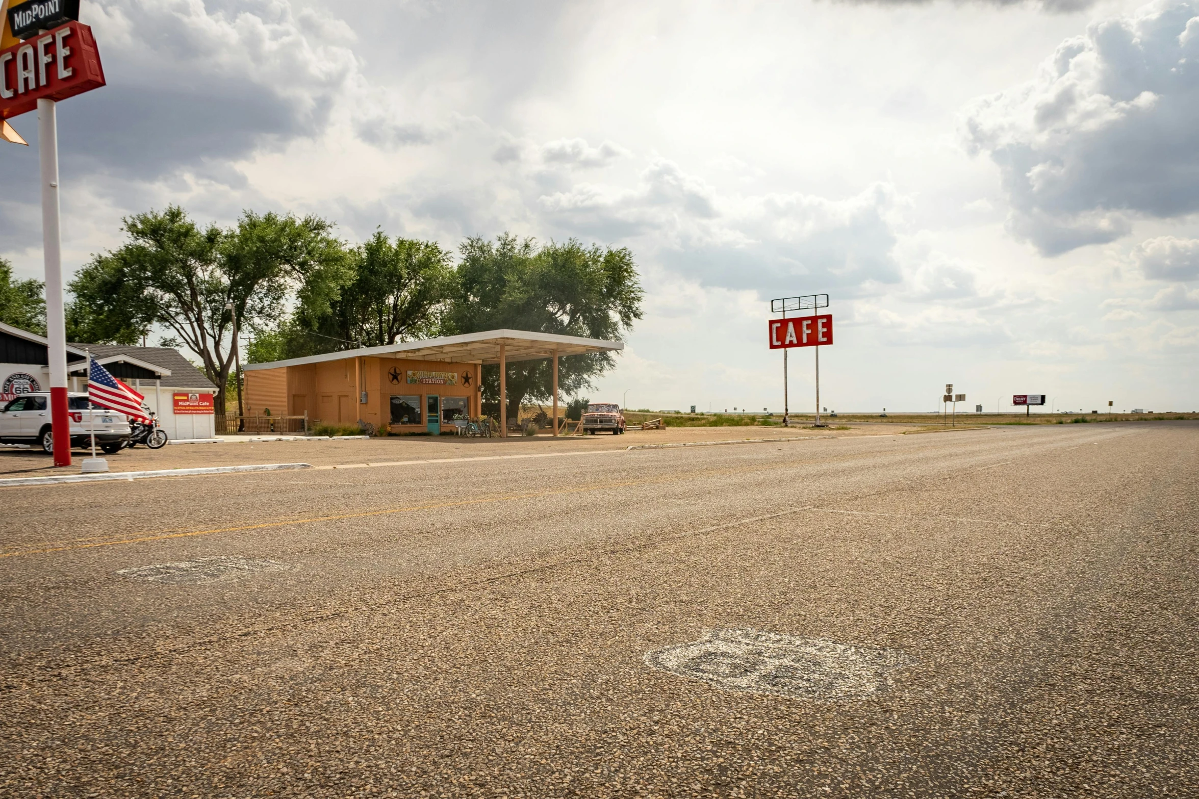 the parking lot of a store on the side of the road