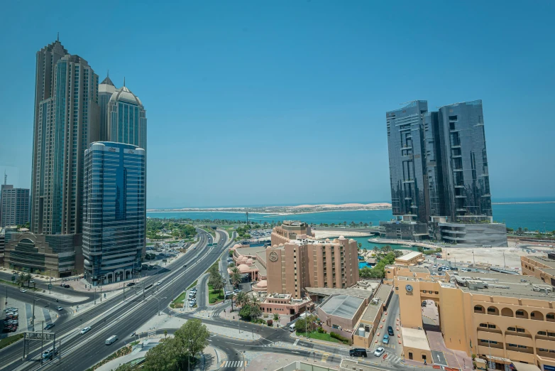 a couple of high rise buildings near the water